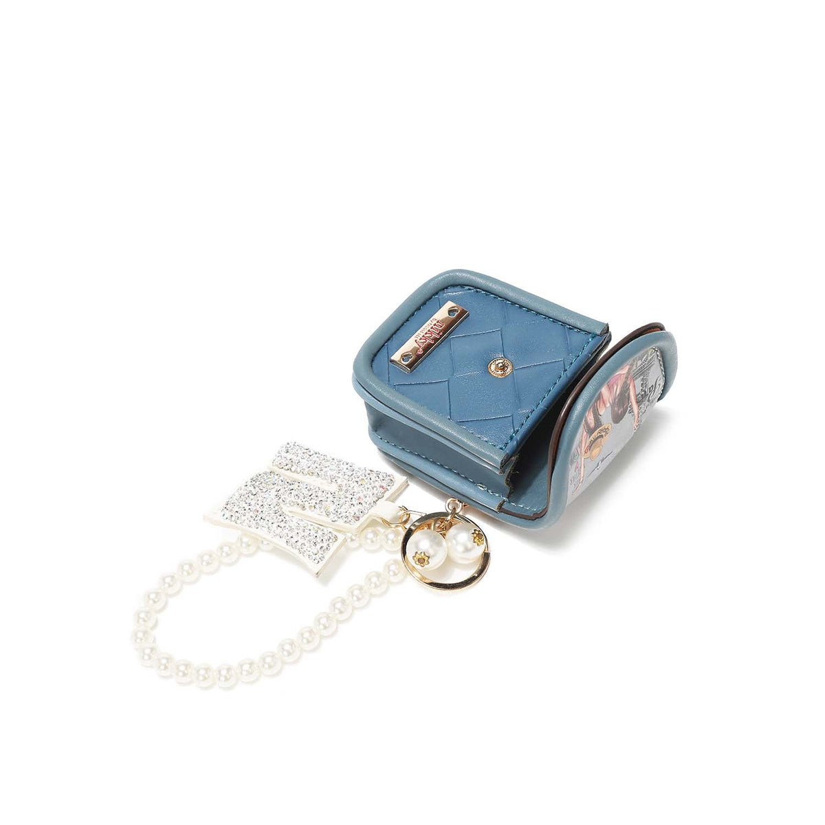 LLAVERO CON PORTA AUDIFONOS Y PULSERA DE PERLAS NIKKY